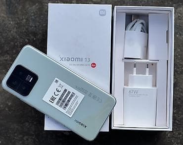 Техника и электроника: Xiaomi 13, 256 ГБ, цвет - Зеленый, 
 С документами — 1