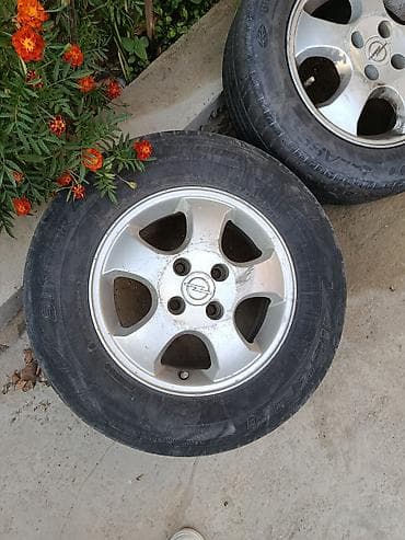 astra stop: Opel üçün 4 ədəd orijinal yüngül lehimli disk + şin komplekti - — 1