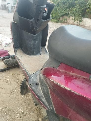 mopet elektrik: Moped qeza olunub qabag plasmaslari ezilib yanlari cizilib ama tok — 2