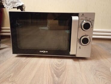 встраиваемые микроволновые печи: Mikrodalğalı soba Eurolux, Ayrıca dayanan, Mikrodalğalar ilə, rəng - Gümüşü, İşlənmiş — 1