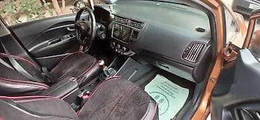 prius 30 kuza: Kia Rio: 1.2 l | 2012 il Sedan — 8