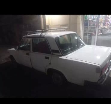 vaz 2107 şəkilləri: VAZ 2107, ağ rəng, sedan kuzov. Mexaniki ötürücü, arxa ötürücülü. 4 — 10