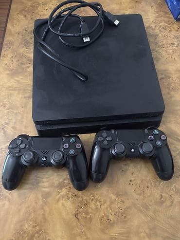 ps4 slim disk: Ps4 slim 1TB ev şəraitində çox az istifadə olunub içərisində 24 ədəd — 1