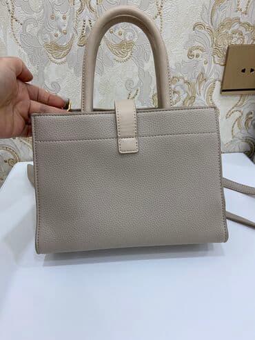 don şəkilləri çəkmək: Çanta satılır,baha alınıb — 2