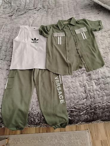 stringer alt geyimi: Üçhissəli geyim dəsti - Ağ rəngli, qolsuz köynək: ön hissədə adidas — 1