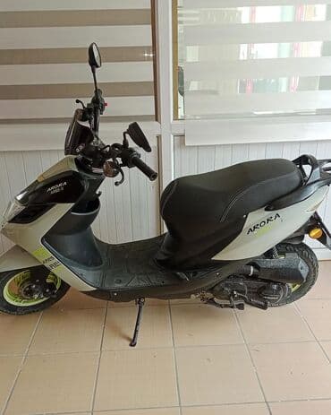 gence traktor zavodu yeni qiymetleri: Skuter – Aerox Ares model - Rəng: boz-gümüşü gövdə, qara üst panel — 5