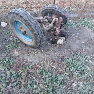 varta аккумулятор: Satılır: Traktorun ön oxu komplekti (çərçivə, şkvorun, dartıcı qollar — 1