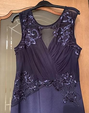 Ingiltereden alınıb. Tund goy, uzeri işlemeli midi don. Geyinilmeyib