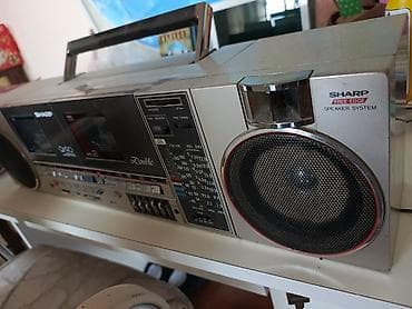 Sharp QT 90 yapon maqnitaonu radiosu işləyir FM də var kaset yeri
