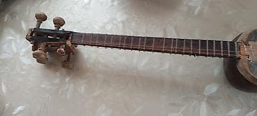 gitara klasik: Məhsul: Tar (xalq simli musiqi aləti).Evde usaqindir illərin — 1