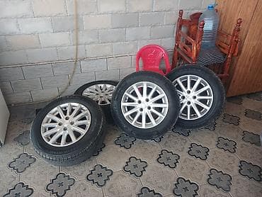 4 teker: 4 ədəd yüngül lehimli disk və şin komplekti tekerler tezedi - — 1