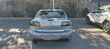 teker 215 65 16: Mazda 323: 2.3 l | 2004 il Sedan — 4
