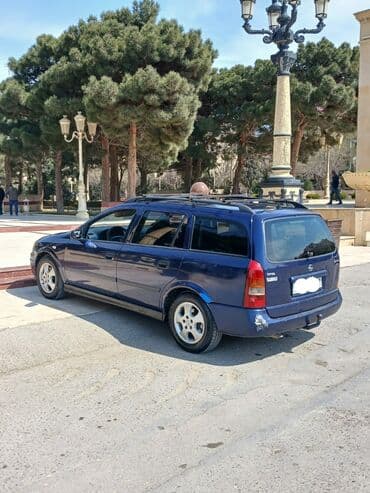 nissan oluxana baksol: Opel Astra: 2 l | 1999 il 600000 km Universal — 3