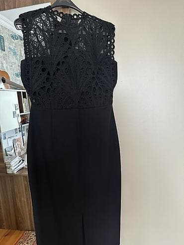 Baha alınıb 2 dəfə geyinilib.42 razmerdir,40-a gedər