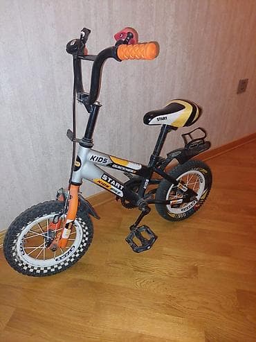 işlənmiş velosiped: 12 lik velosiped. Yan tekerleri de var, sadece cixarilib. Geri taxila — 2
