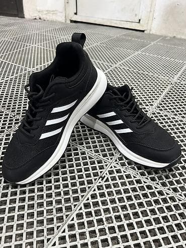 mizuno: Qara rəngdə idman ayaqqabısı - Üst hissə: nəfəs alan tor material və — 1