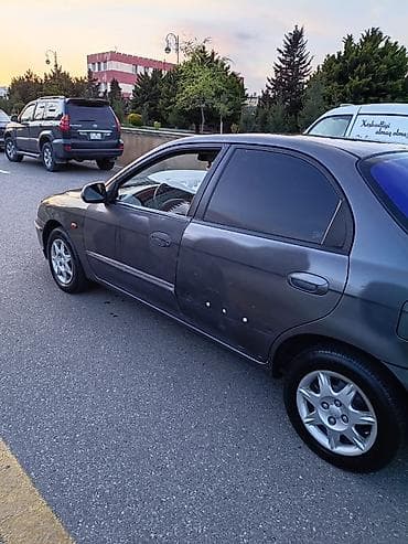 kia rio 2005: Kia Sephia: 1.6 l | 2003 il Sedan — 4