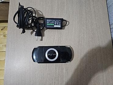 philips xenium 9@9d: PSP 2000 modeli original adapteri ile birlikde. Qiymetde razilasma — 2