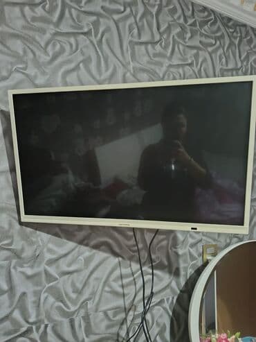 установка телевизора на стену бишкек: İşlənmiş Televizor Hoffmann LED ekran 82" Rayonlara çatdırılma — 1