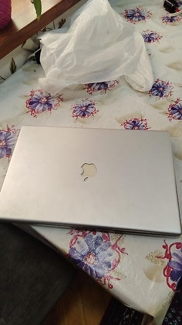 diş ağardan: Apple PowerBook G4 noutbuku - Geniş ekran: təxminən 17" mat displey — 1