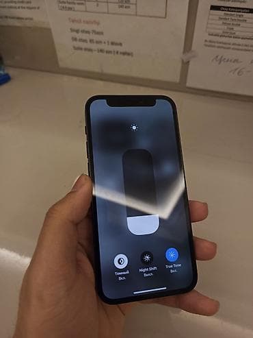 ipona: IPhone 12, 64 GB, Qara, Face ID — 7
