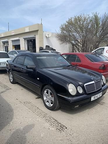 mercedes most: Mercedes-Benz E-Class: 2.4 l | 1998 il Sedan — 2
