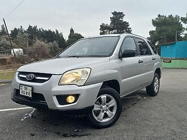 arxa bufer: Kia Sportage – gümüşü rəngdə kompakt krossover/SUV Xüsusiyyətlər: - — 1