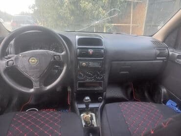 oturacaq uzlukleri: Model: Opel Astra Caravan (Universal kuzov) Rəng: qırmızı Kuzov: 5 — 4