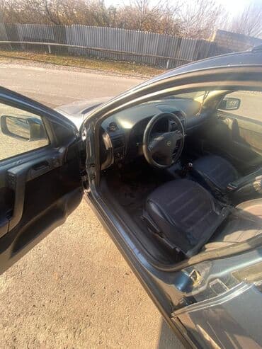 oka satılır: Model: Opel Astra Caravan (universal kuzov) Rəng: tünd boz Yanacaq — 6