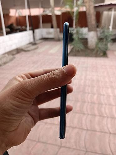 redimi 9 a: Samsung Galaxy A50, 128 GB, rəng - Mavi, Barmaq izi — 1