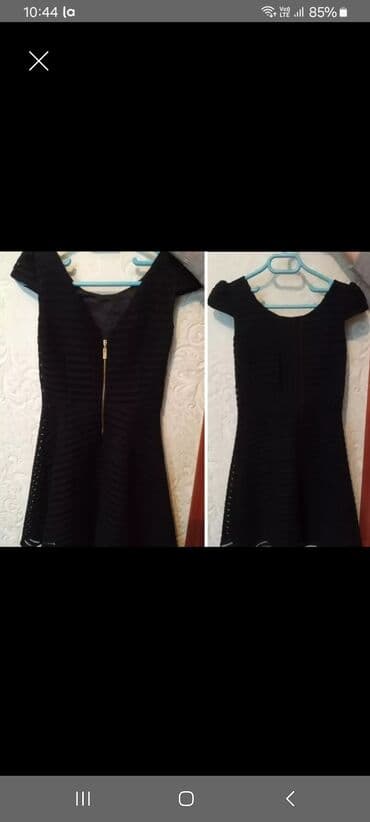 Qara rəngli qadın paltarı - Model: beldən oturan, ətəyi A-kəsim, dizə