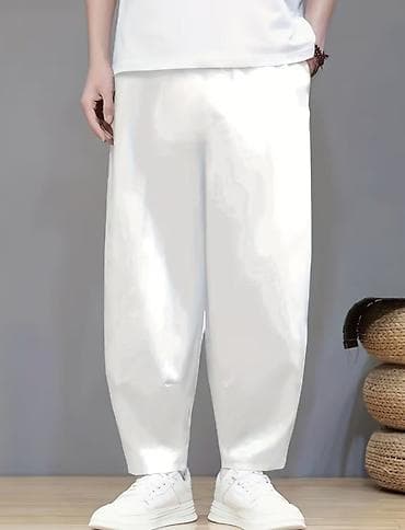 Ağ rəngli kişilər üçün geniş kəsimli şalvar - Model: geniş və rahat