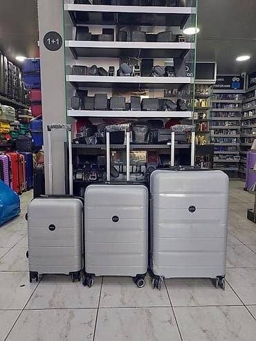 Çamadanlar: Sərt korpuslu gümüş rəngli çamadan dəsti – 3 ölçü - Korpus: yüngül və — 1