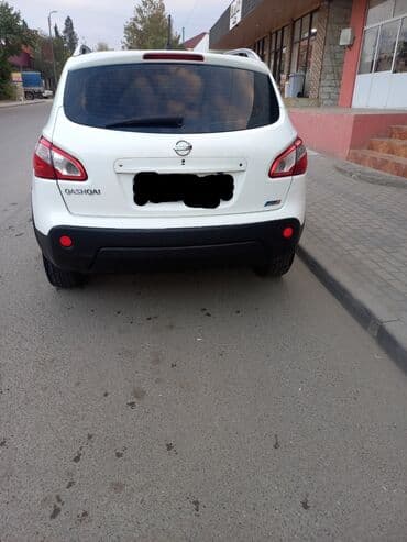турбо аз подержанные автомобили таеота приюс аренд: Nissan Qashqai, ağ rəngli şəhər-krosoveri. Xüsusiyyətlər və detallı — 3