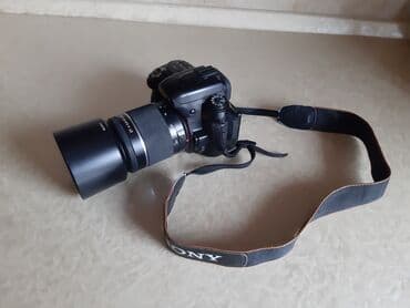 knopkalı: Fotoaparat Sony a500. Probeqi azdır. Şəkil çəkmək üçün knopkası — 1