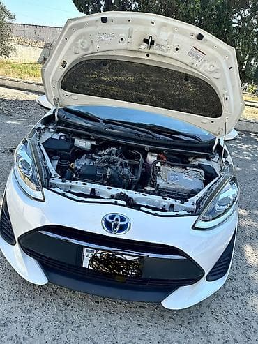 aqua disk: Toyota Aqua Hybrid hatchbek - Yanacaq sistemi: Hibrid (benzin + — 4