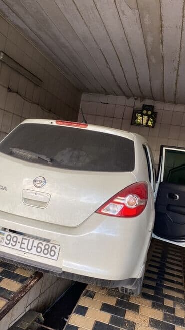 фольксваген тигуан 1 4: Nissan Tiida: 1.5 л | 2011 г. Хэтчбэк — 1