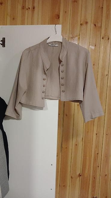 Brend: Tiken Model: Qısa kəsimli qadın jaketi - Rəng: Açıq bej -