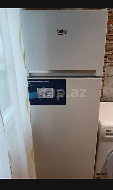 iphone 12 pro max dubai version: Beko soyuducu, yuxarıda dondurucu bölməsi olan ikiqapılı modeldir. Ağ — 3