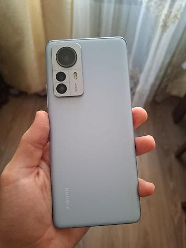 Xiaomi 12 Pro, 256 GB, rəng - Mavi, 
 Face ID, Simsiz şarj, Barmaq izi — 1