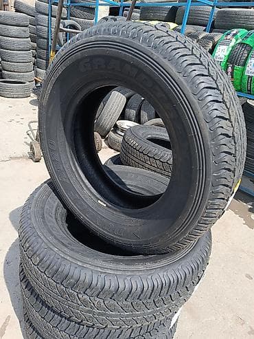 mon af50: Şin Dunlop 265 / 65 / R 17 — 3
