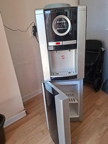 apple 15 pro max: Mengchi stasionar su dispenseri – üstdən butulka quraşdırılan model — 1