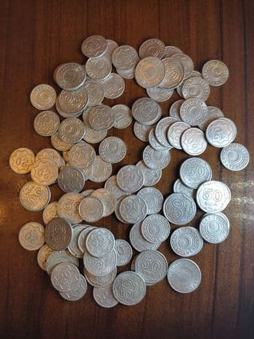 10 qəpik: Tədavüldən çıxarılmış 1992,1993 ilin milli qəpikləri. 50 qəpik - 24 — 1