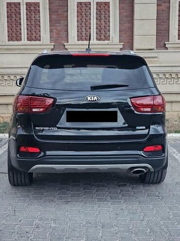 багажник на крышу авто: Kia Sorento – tam ölçülü ailəvi krossover • Kuzov: qara, parlaq xrom — 2