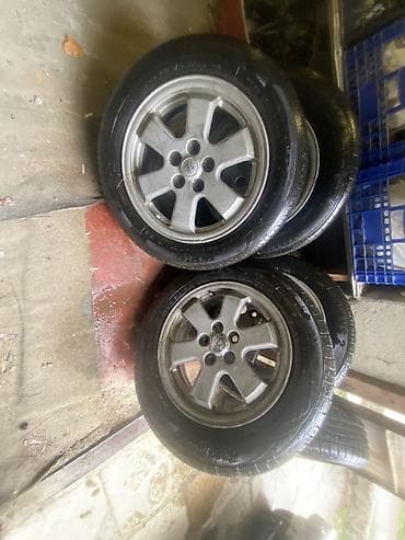 Шины: Toyota orijinal yüngül lehimli disklər və şinlər komplekti - — 4