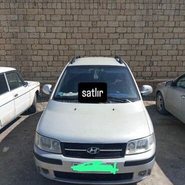 yeşqa maşın: Hyundai Matrix, ağ rəng, şəhərdaxili və ailə istifadəsi üçün praktik — 2