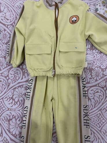 Cinslər və şalvarlar: Uşaq trenka dəstləri (2 ədəd) 1) Krem-qəhvəyi dəst: - Üst: krem — 2