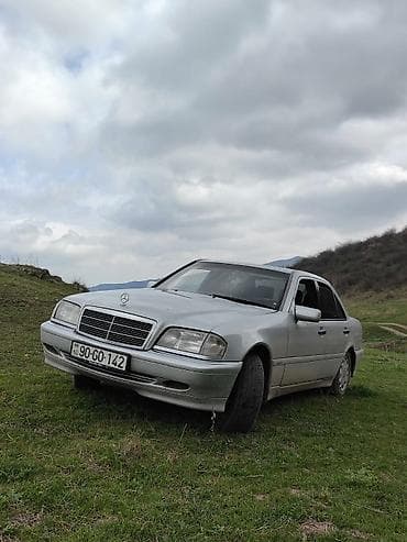 hyundai coupe satilir: Mercedes-Benz C-Class sedan (W202), gümüş rəng. - Kuzov: 4 qapılı — 2