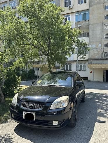 diskilər: Kia Rio: 1.4 l | 2008 il Sedan — 1