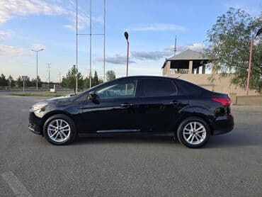 инвертор с 12 на 220 вольт: Ford Focus sedan – qara rəng, benzinlə işləyən, ön ötürücülü. Xarici — 6